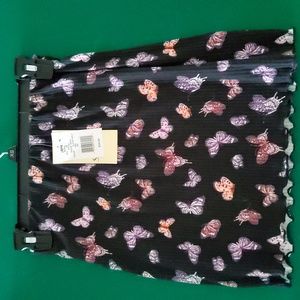 Mini skirt size XS. Black w/ Butterflies 95% cotton 5% Spandex